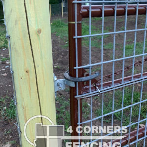 This is a 3-rail dowelled pole fence with high-tensile electric wire that is very effective at keeping bears out of a property. We use a powerful 110 volt chargers to power the intermittent electricity scare the bears but not injure them. <br/>© Copyright 4 Corners Fencing, llc