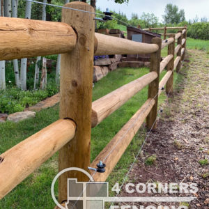This is a 3-rail dowelled pole fence with high-tensile electric wire that is very effective at keeping bears out of a property. We use a powerful 110 volt chargers to power the intermittent electricity scare the bears but not injure them. <br/>© Copyright 4 Corners Fencing, llc